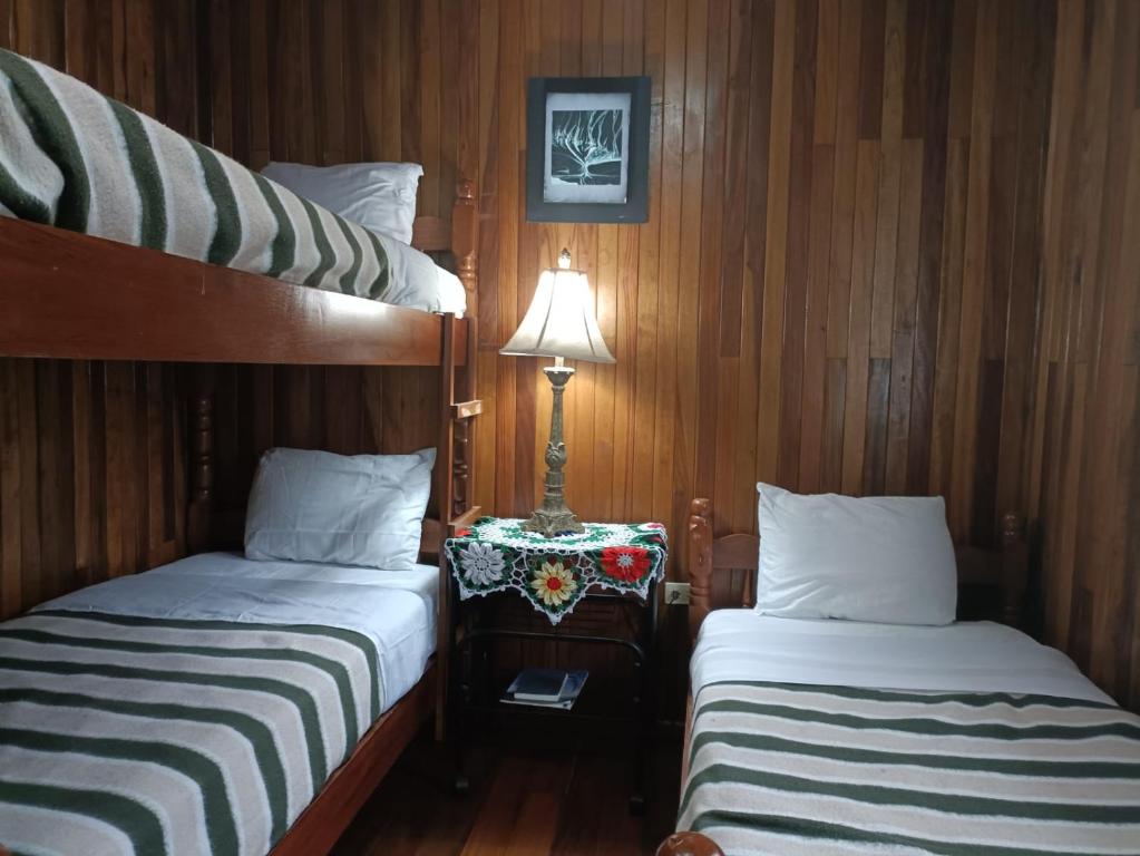 Triple Room — balcony with mountain view